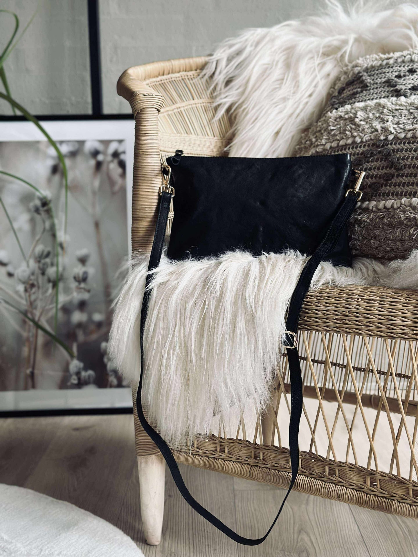 Clutch in schwarzem Leder