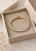 Tennisarmband Thelma mit Zirkonia - vergoldet
