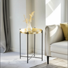 Tabletttisch in Gold