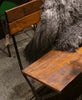 Bank aus Eisen und recyceltem Holz