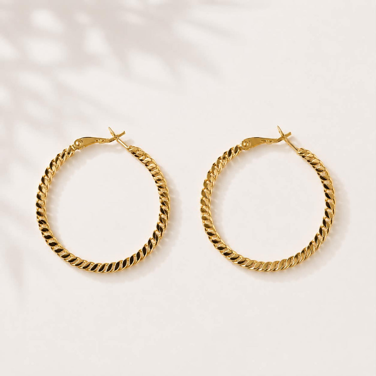 Ohrringe Hallie twist hoop - vergoldet