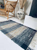 Teppich aus geflochtenem Leder – 60x90 cm Grau/Blau mit Silberstreifen