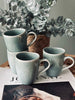 Becher mit Henkel aus Steingut – Mint
