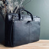Laptop-Tasche aus schwarzem Leder mit zusätzlichen Fächern