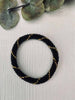 Nepal-Armband - Schwarz mit goldenem Streifen