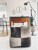 Pouf aus grauem Leder