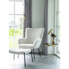 Hocker aus imitiertem Lammfell